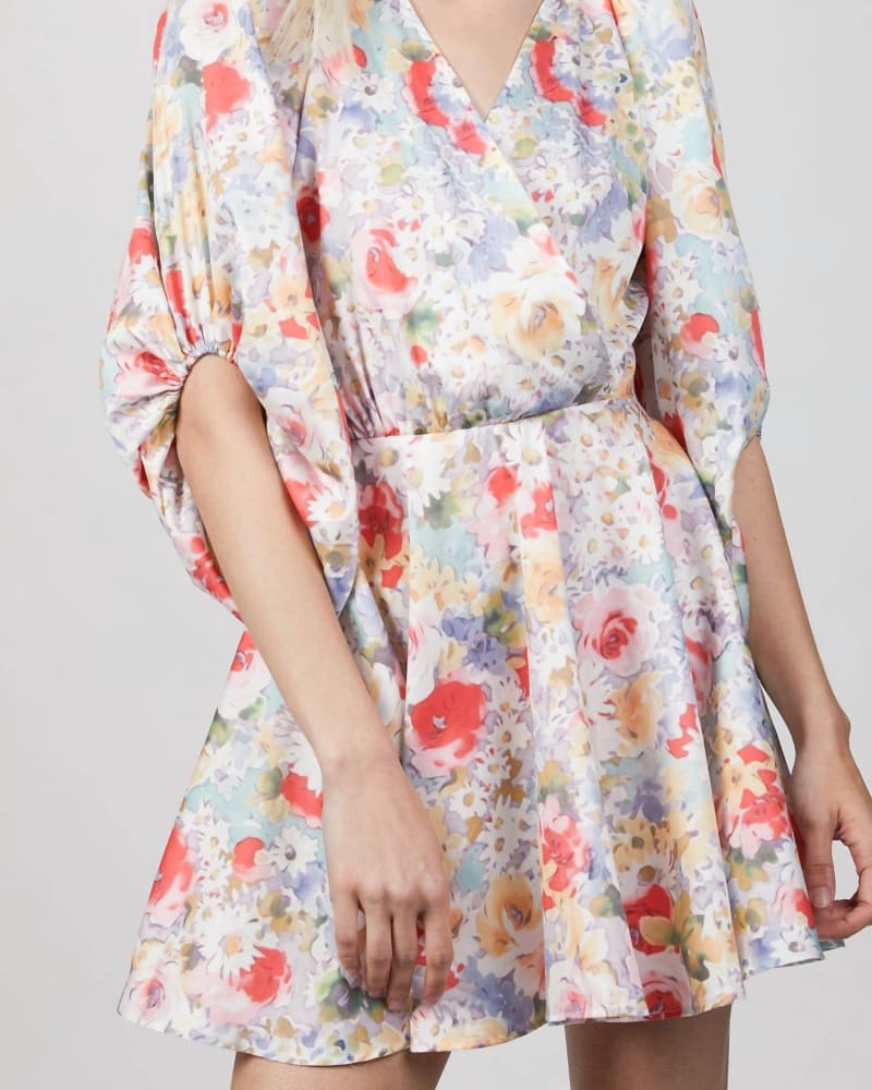 Front of a model wearing a size L Mini Dress With Bow in Pastel Flower Print in Pastel Flower Print by Art dealer.. | dia_product_style_image_id:336238